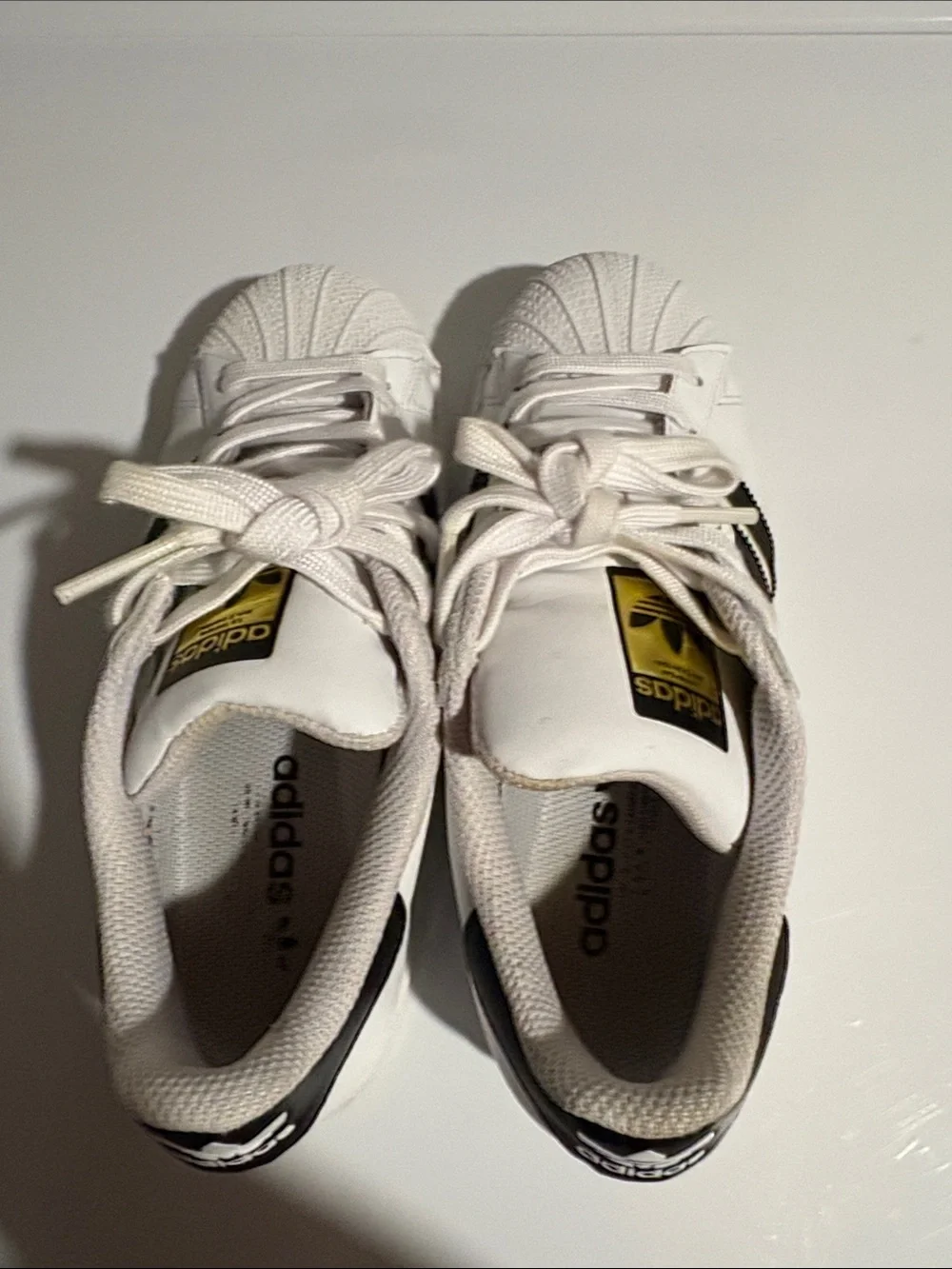 Adidas Superstar Big Kid Sneaker with white & black Shell-Toe Gold Accents